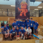 Gruppenfoto Herrenmanschaft auf Rampe